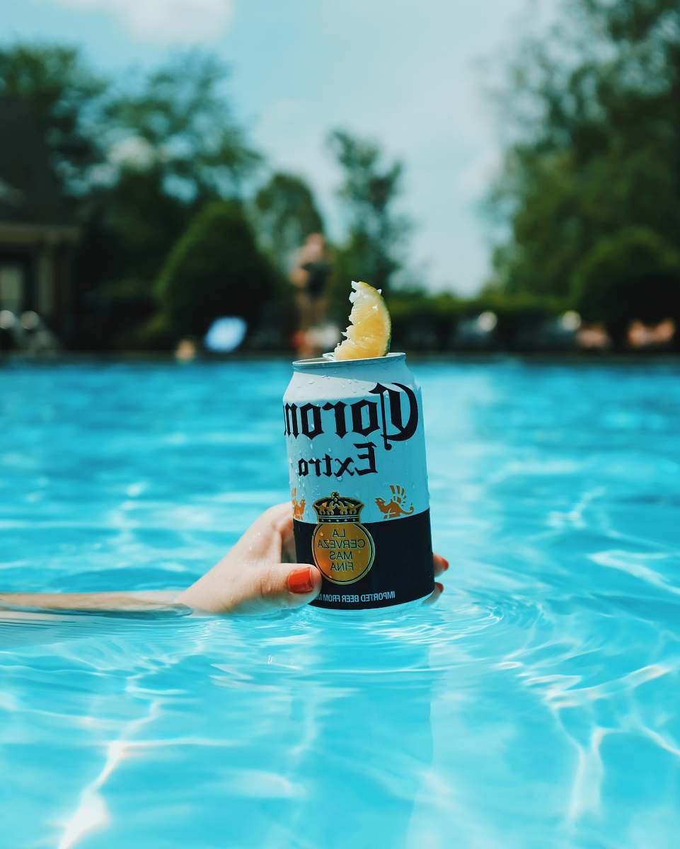drink Corona extra beer can on swimming pool nashville
